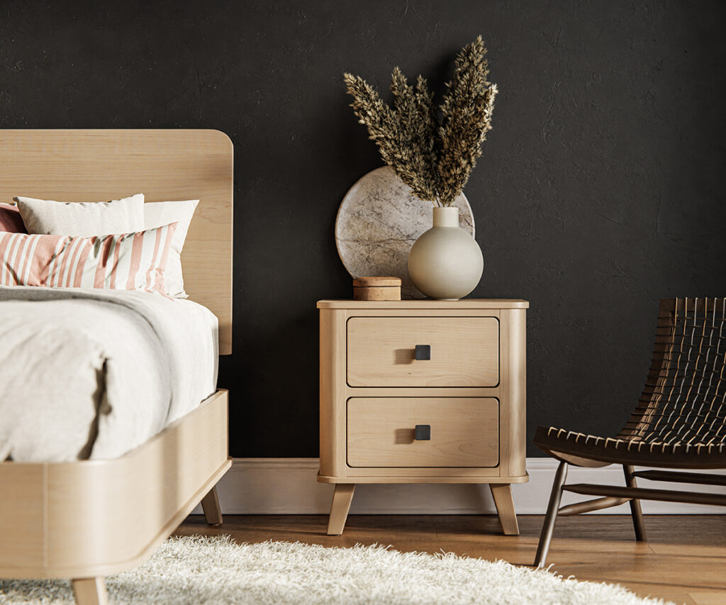 Modern bedroom with light oak wood nightstand, bed frame, and neutral decor.