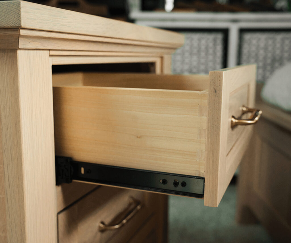 Solid wood drawer with smooth glide showcasing Amish furniture craftsmanship.