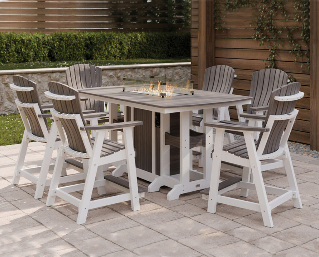 Poly patio fire table set with eight counter-height chairs on paver patio.